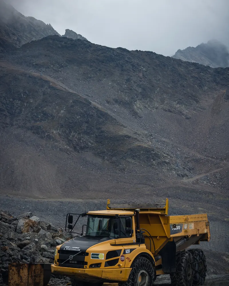 Articulated dump truck working on a mine